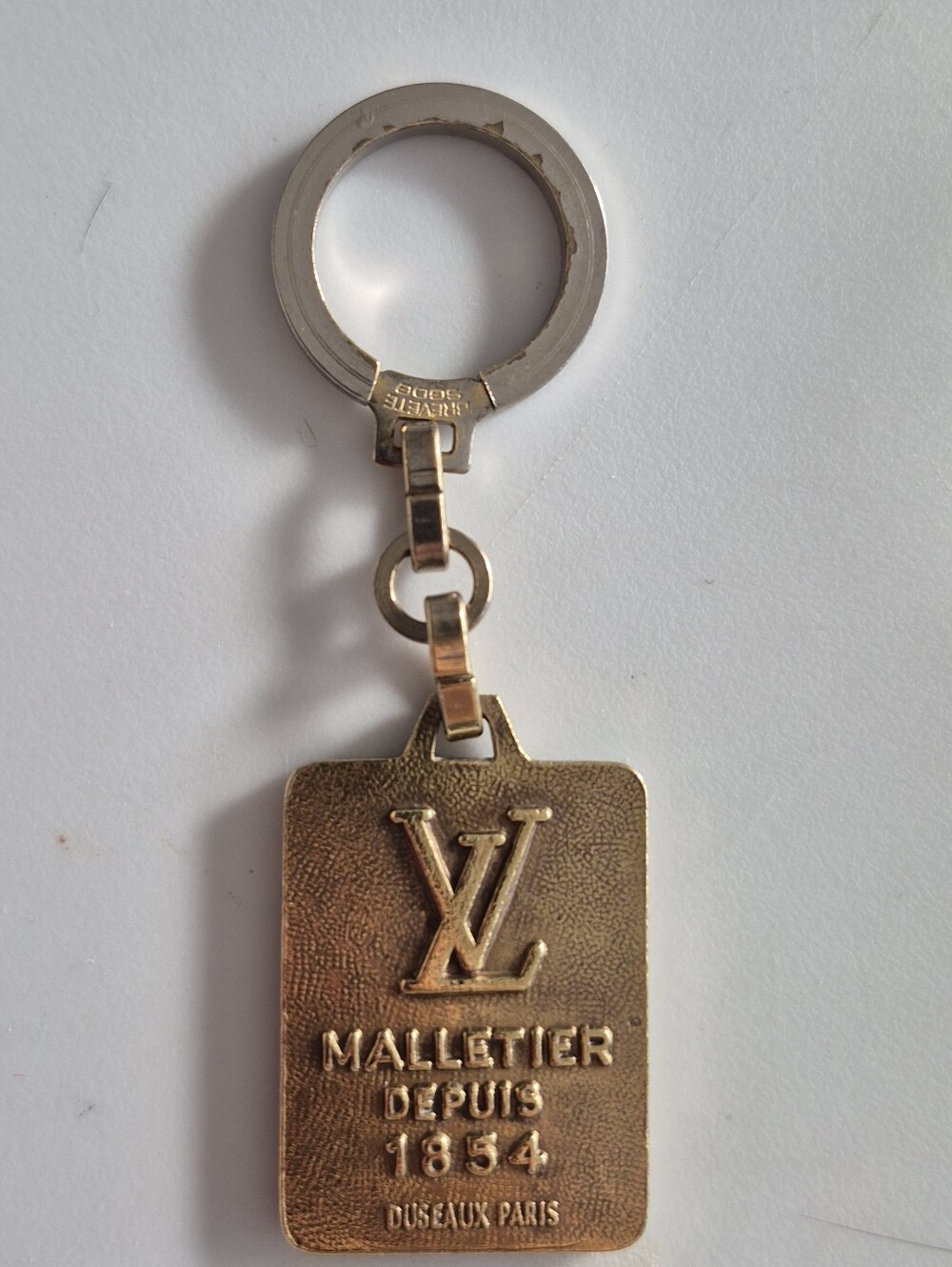 Louis Vuitton Malletier Depuis 1854 Keychain